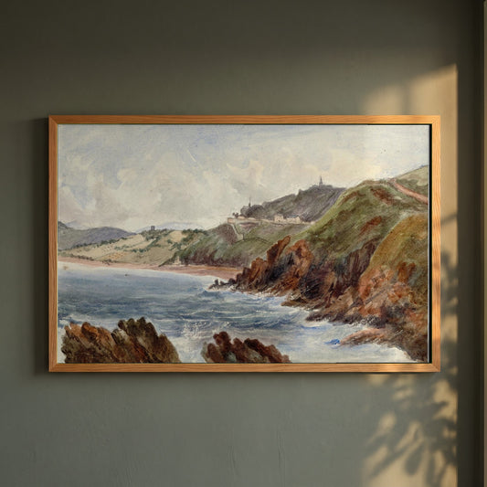 Bray Head framed print in a natural oak frame on a dark green wall beside a window, dappled plant shadow