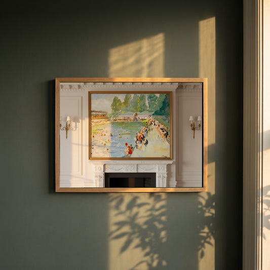 Chiswick Baths framed print in a natural oak frame on a dark green wall beside a window, dappled plant shadow