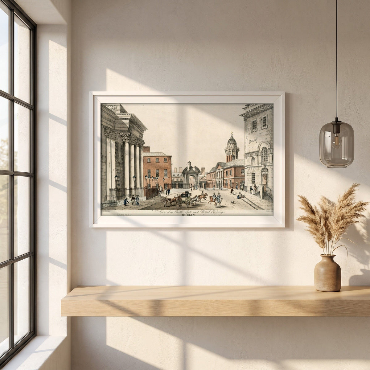 Dublin Castle Gate framed print in a white frame on a plaster wall above an oak worktop in a bright Scandinavian kitchen