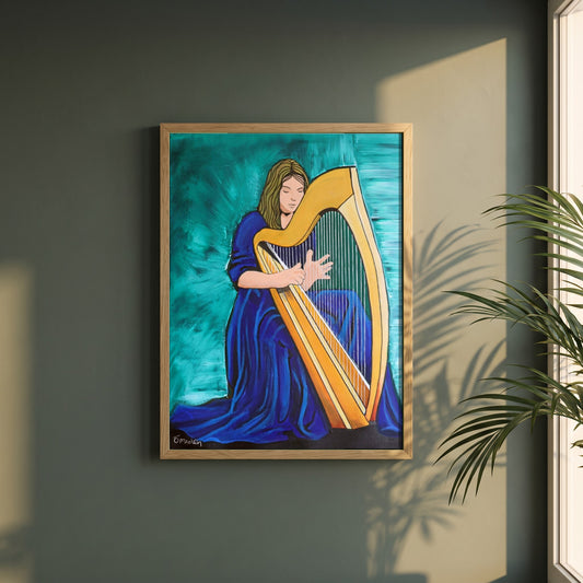 Irish Harp framed print in a natural oak frame on a dark green wall beside a window, dappled plant shadow