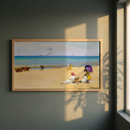 On The Sands framed print in a natural oak frame on a dark green wall beside a window, dappled plant shadow