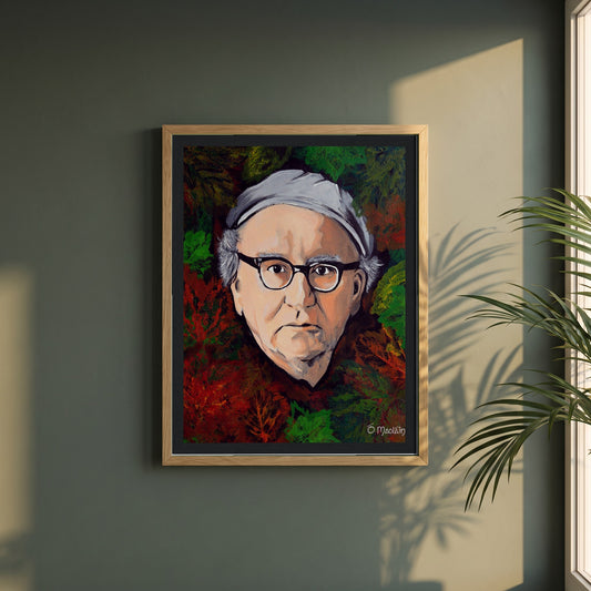 Patrick Kavanagh framed print in a natural oak frame on a dark green wall beside a window, dappled plant shadow