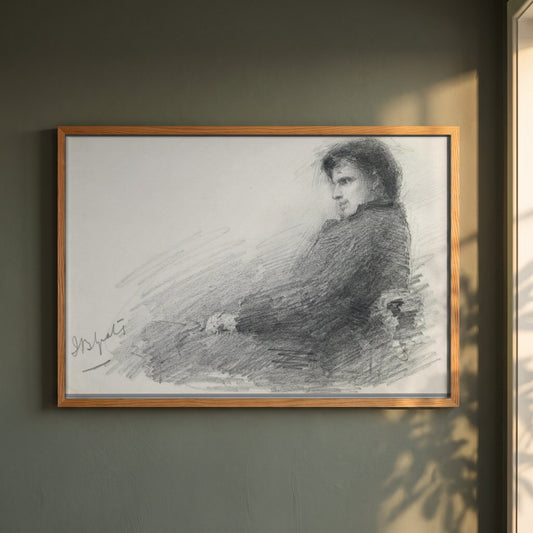 Portrait of a Young W.B. Yeats framed print in a natural oak frame on a dark green wall beside a window, dappled plant shadow