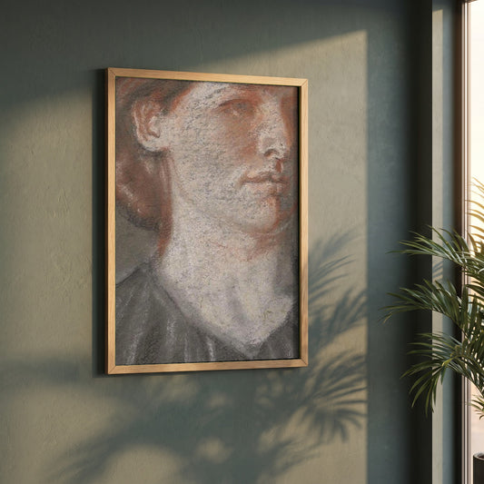 Portrait of Grace framed print in a natural oak frame on a dark green wall beside a window, dappled plant shadow