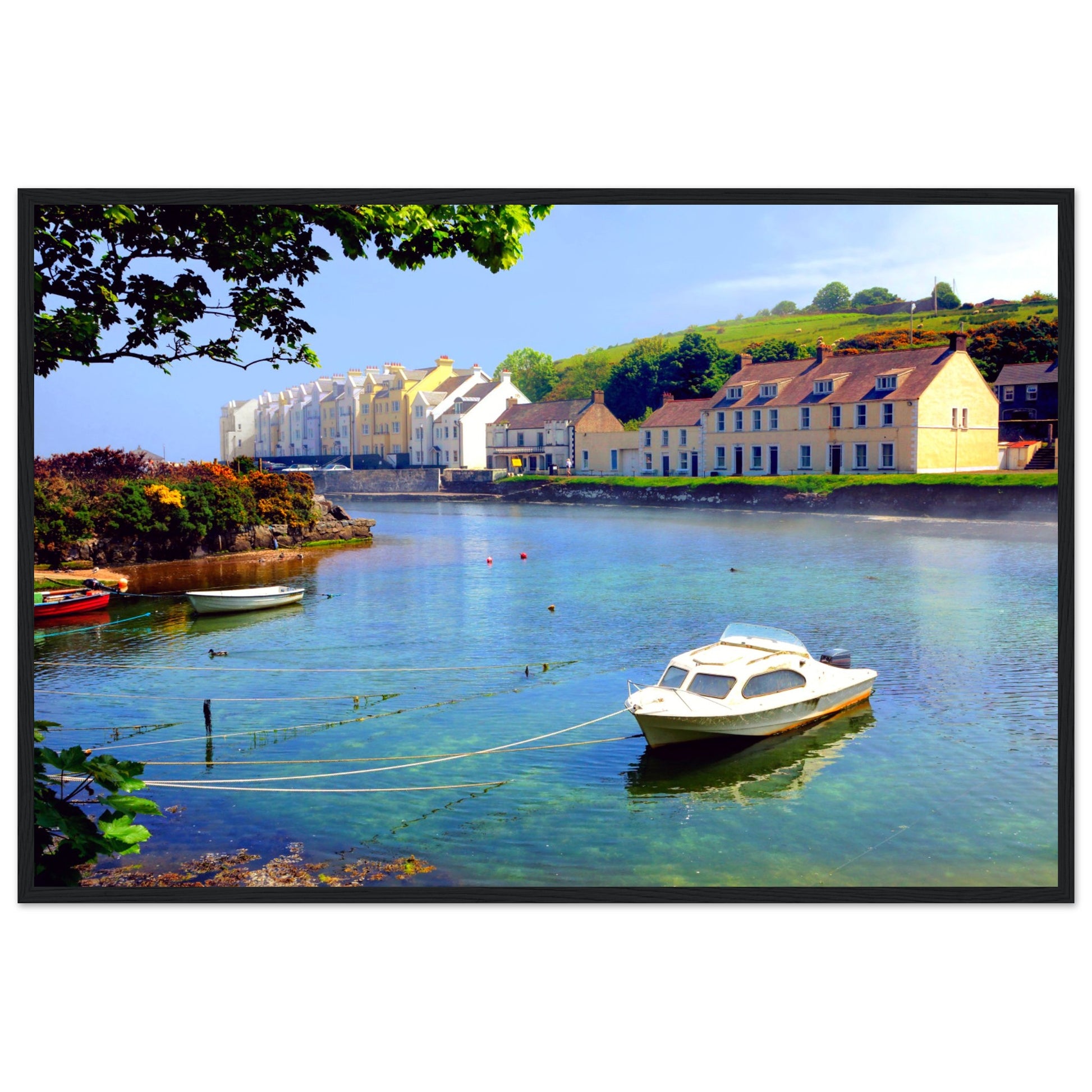 Serene coastal view of Cushendun, Northern Ireland at sunrise. Rustic wooden frame complements natural tones.