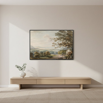 Framed landscape painting on a wall above a wooden console table.