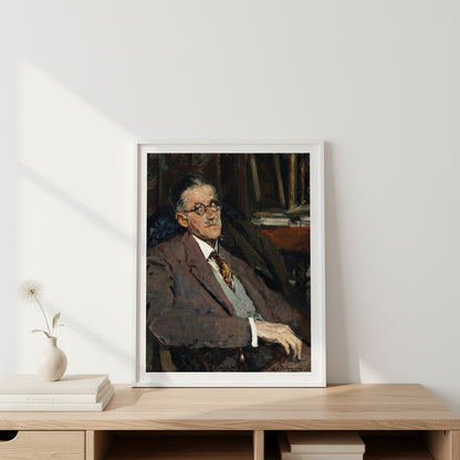 James Joyce 1934 portrait in a white wooden frame, leaning softly against a white wall on a wooden console table, bright natural lighting from the left, soft shadows, airy Nordic interior, premium fine art atmosphere.