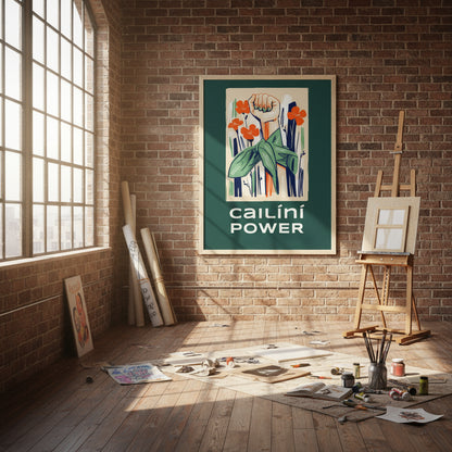 Large poster-style Cailíní Power print displayed in a creative loft space with exposed brick, rolled protest posters, easel, and sunlight through industrial windows.