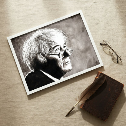 framed art print laid on textured linen surface beside reading glasses, a quill pen, and a leather-bound poetry book — softly lit to highlight the matte paper texture. Immerse your space in the poetic brilliance of Seamus Heaney with our framed fine art print. This carefully crafted portrait print pays homage to the lyrical genius of the beloved Irish poet. 