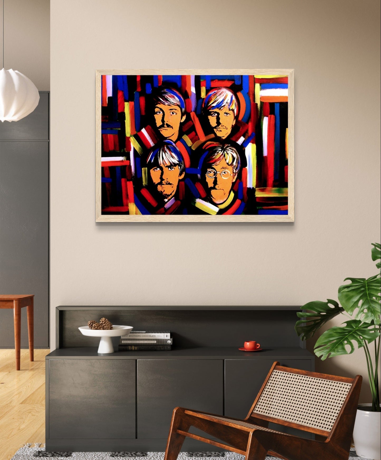 Colorful art print featuring portraits of the Fab Four: John Lennon, Paul McCartney, George Harrison, and Ringo Starr, capturing the essence of Beatlemania and their enduring musical legacy.