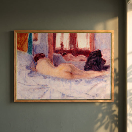 A Reclining Figure before a Mirror framed print in a natural oak frame on a dark green wall beside a window, dappled plant shadow