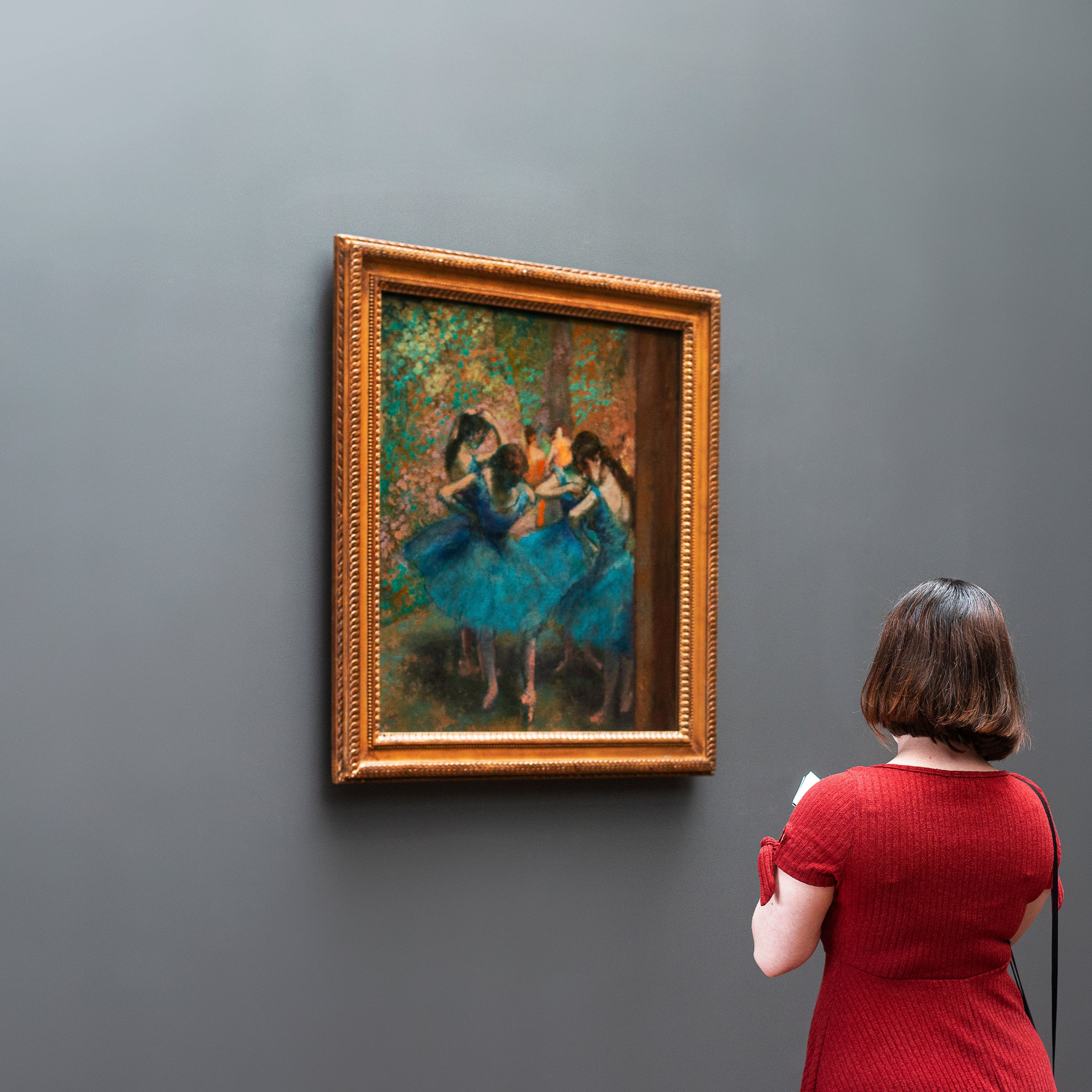 Buy Irish Art Online Women looking at a painting in a art gallery Dublin Ireland