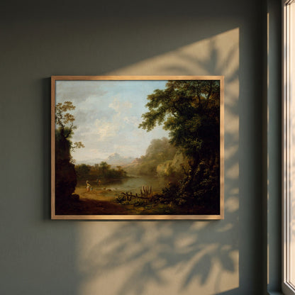 An Italianate Wooded River Landscape with Figures framed print in a natural oak frame on a dark green wall beside a window, dappled plant shadow