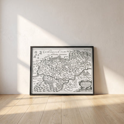 Barony of Idrone, County Carlow c.1600 Map by Van den Keere Print framed print in a black frame leaning against a white plaster wall on oak floorboards in morning light