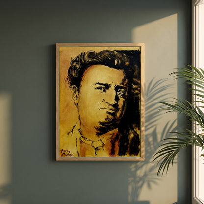Brendan Behan framed print in a natural oak frame on a dark green wall beside a window, dappled plant shadow
