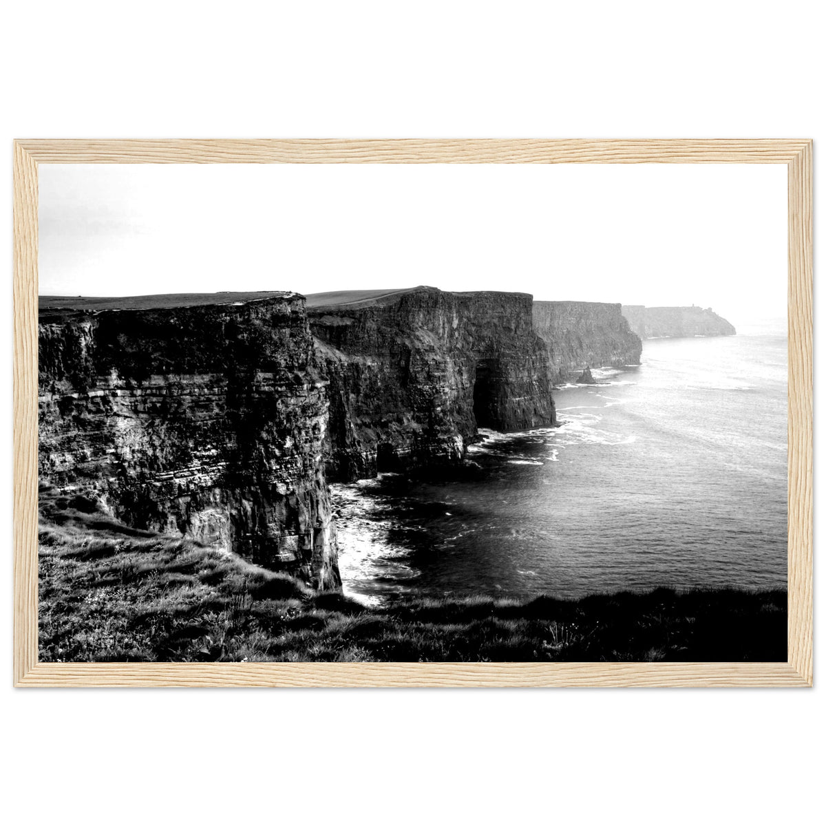 Cliffs of Moher black and white photographic print in a light oak frame