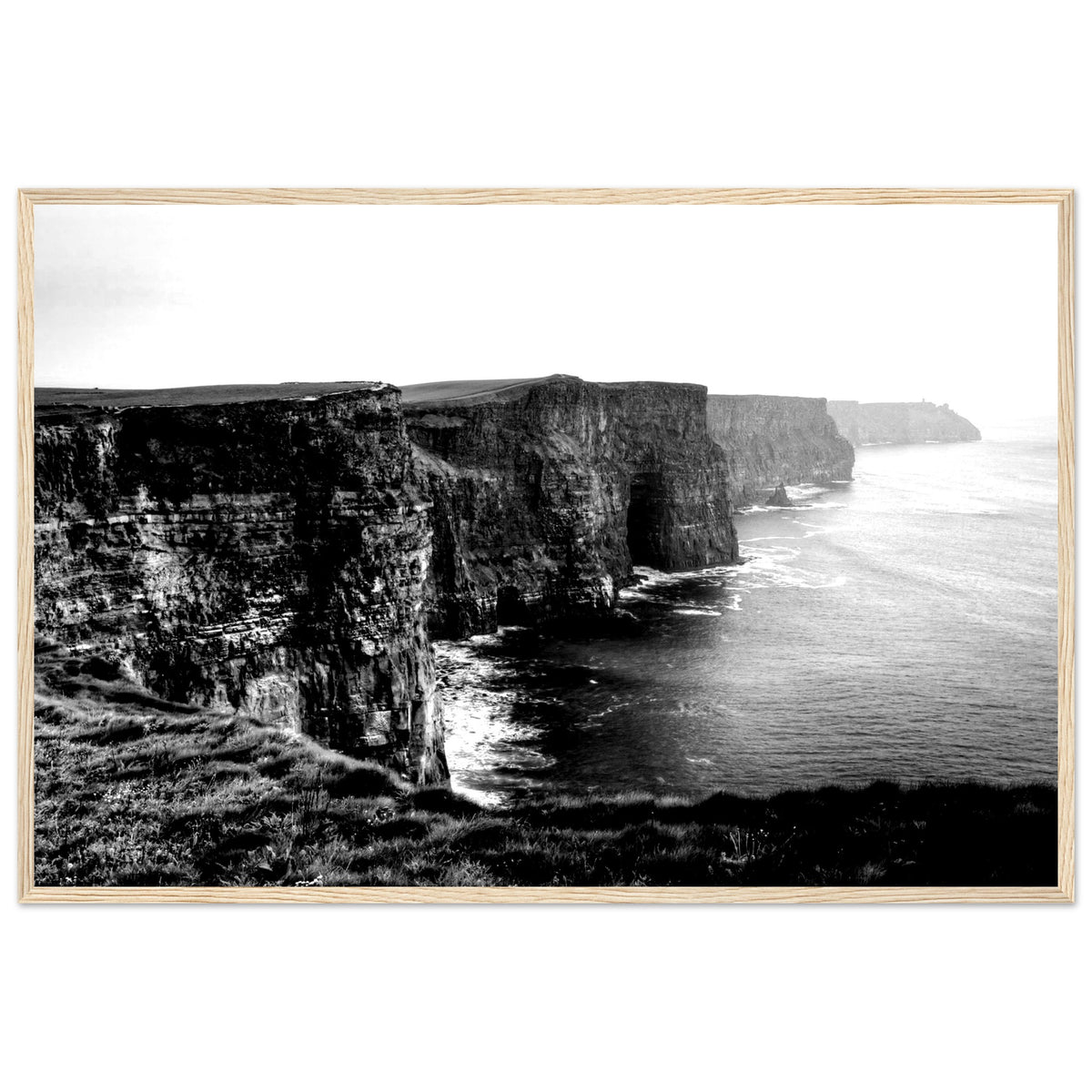 Cliffs of Moher black and white photographic print in a natural oak frame with a thin white edge