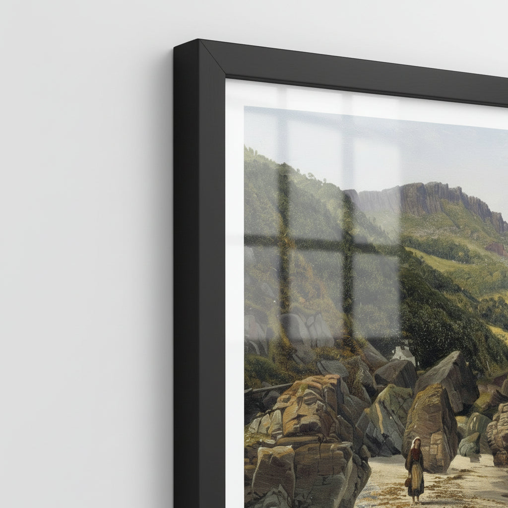 Close-up shot of the Murlough Bay and Fair Head print showing fine paper texture, sharp detail in rocks and waves, Black frame corner and shatterproof plexiglass edge, soft side lighting, archival feel
