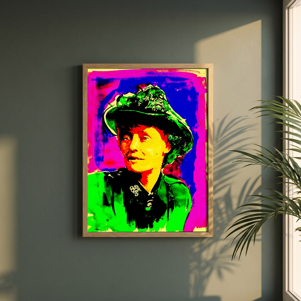 Countess Markievicz framed print in a natural oak frame on a dark green wall beside a window, dappled plant shadow