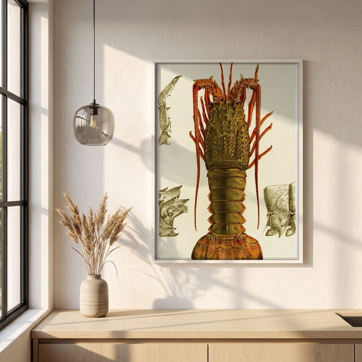 Crustacea I by Frederick McCoy framed print in a white frame on a plaster wall above an oak worktop in a bright Scandinavian kitchen