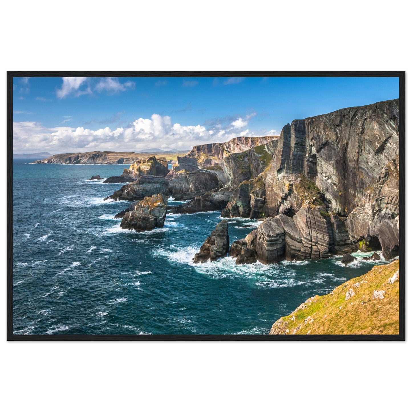 Captivating framed print of Mizen Head, County Cork, Ireland. Features dramatic Atlantic coast, towering cliffs, and raw power of ocean. Perfect decor for nature lovers.