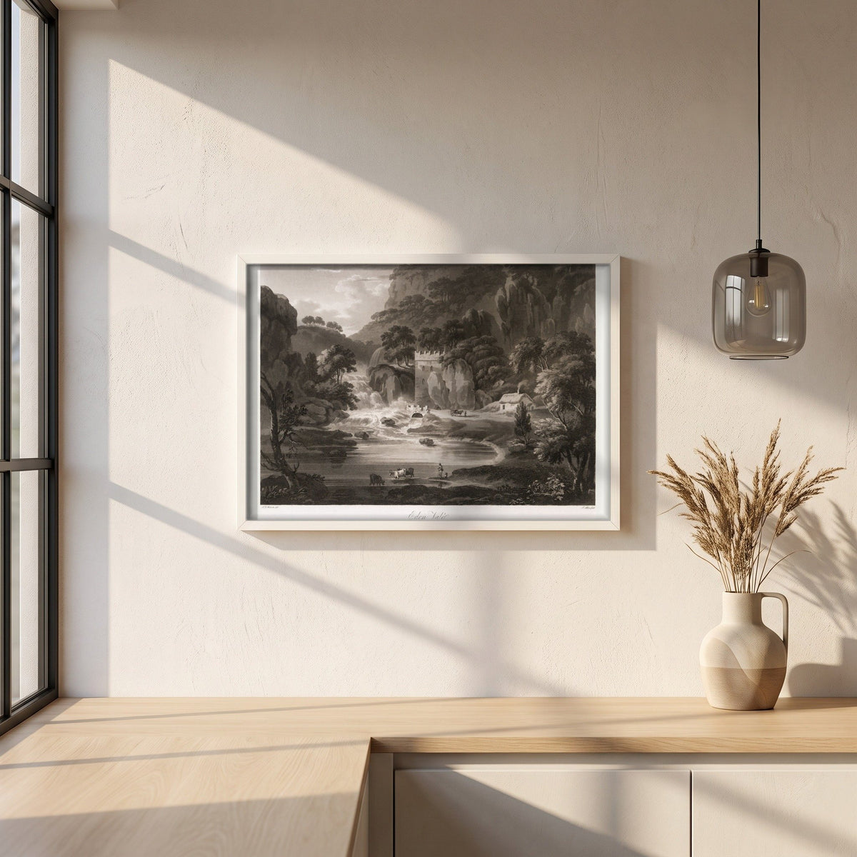 Eden Vale by Thomas Sautelle Roberts Art Print framed print in a white frame on a plaster wall above an oak worktop in a bright Scandinavian kitchen