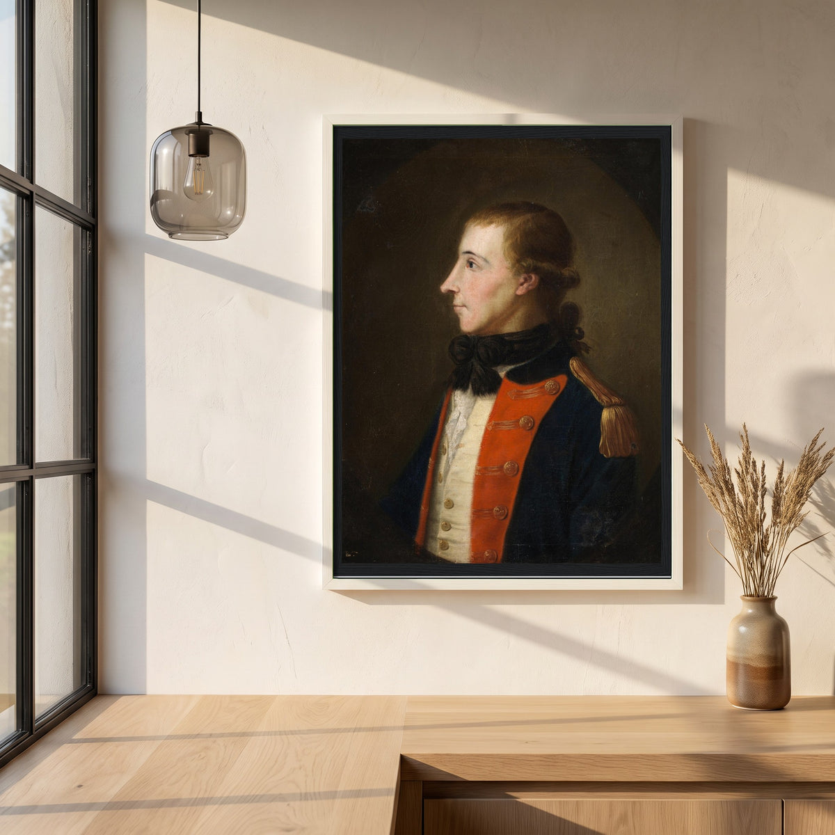 Theobald Wolfe Tone framed print in a white frame on a plaster wall above an oak worktop in a bright Scandinavian kitchen