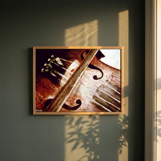 Irish Fiddle & Bow framed print in a natural oak frame on a dark green wall beside a window, dappled plant shadow