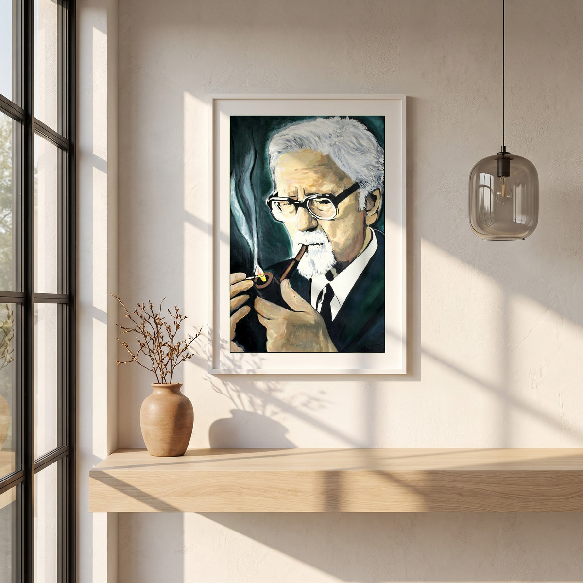 John Hewitt framed print in a white frame on a plaster wall above an oak worktop in a bright Scandinavian kitchen