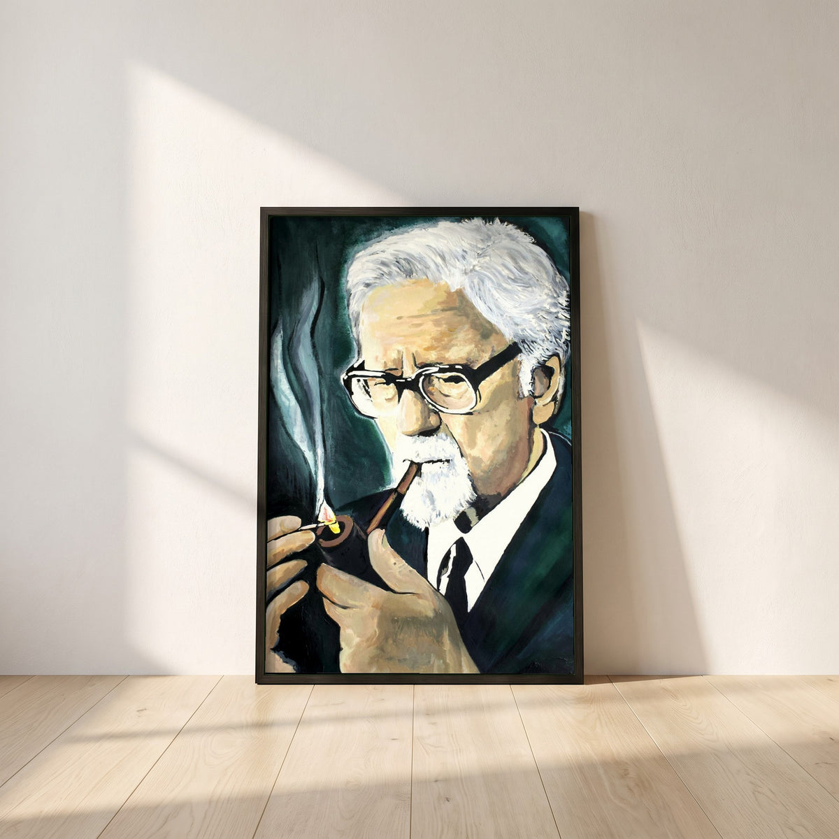 John Hewitt framed print in a black frame leaning against a white plaster wall on oak floorboards in morning light