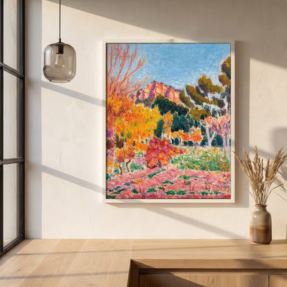 Landscape Cassis framed print in a white frame on a plaster wall above an oak worktop in a bright Scandinavian kitchen