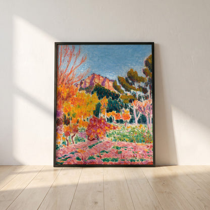 Landscape Cassis framed print in a black frame leaning against a white plaster wall on oak floorboards in morning light