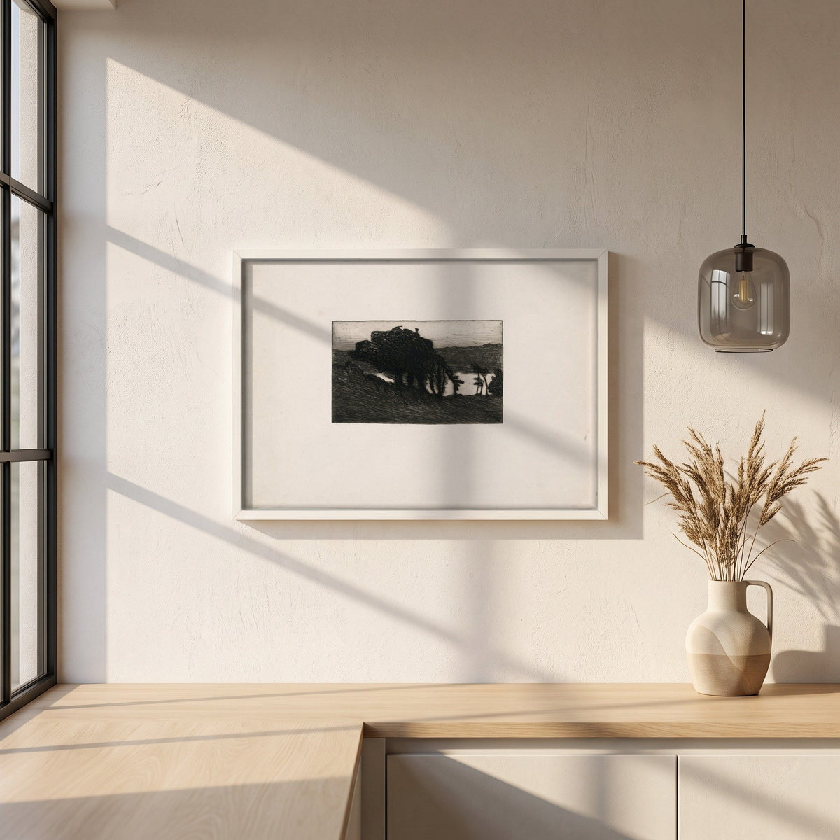 Landscape with Dark Trees and a River framed print in a white frame on a plaster wall above an oak worktop in a bright Scandinavian kitchen