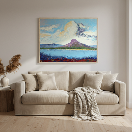 Lurig Mountain from the Shore by Ó Maoláin framed Irish art print above a linen sofa in a warm living room