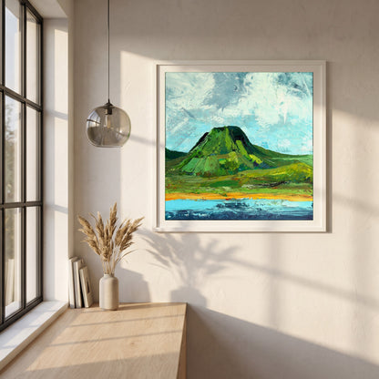 Lurig Mountain, Cushendall framed print in a white frame on a plaster wall above an oak worktop in a bright Scandinavian kitchen