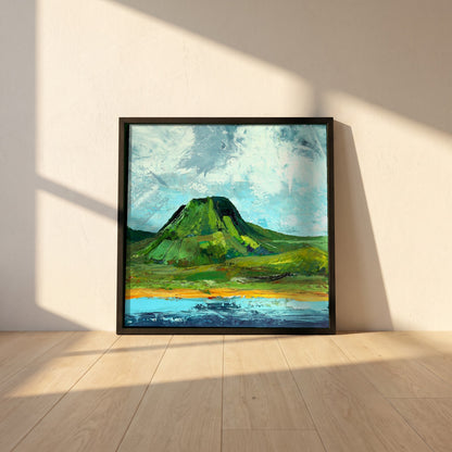 Lurig Mountain, Cushendall framed print in a black frame leaning against a white plaster wall on oak floorboards in morning light