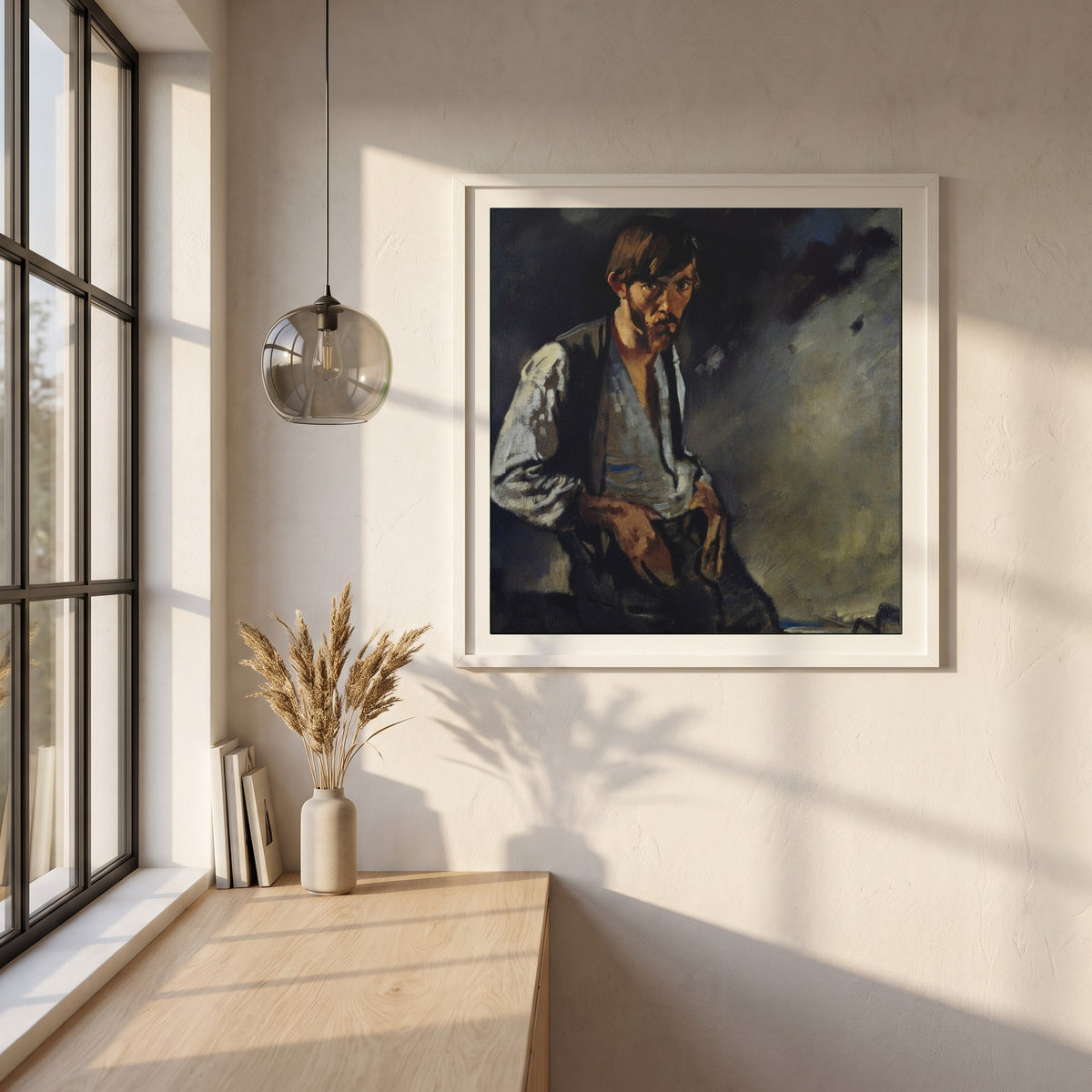 Man of the West, Seán Keating framed print in a white frame on a plaster wall above an oak worktop in a bright Scandinavian kitchen