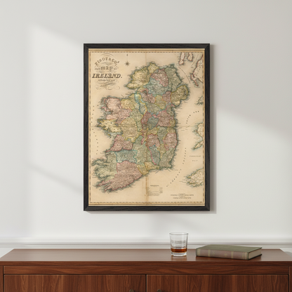 Framed map of Ireland print displayed above sideboard in warm living room setting | Buy Irish Art