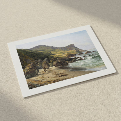 Murlough Bay & Fair Head – Irish Landscape Print. 30x45cm unframed archival print resting on light linen fabric. Soft natural daylight, gentle shadows, artisanal fine-art photography style.