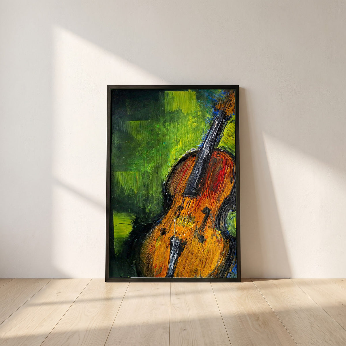 Old Irish Fiddle framed print in a black frame leaning against a white plaster wall on oak floorboards in morning light