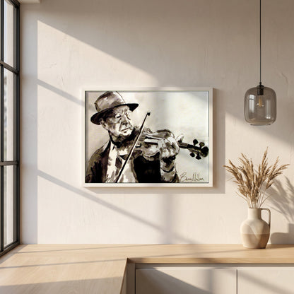 Old Irish Traditional Fiddle Player framed print in a white frame on a plaster wall above an oak worktop in a bright Scandinavian kitchen