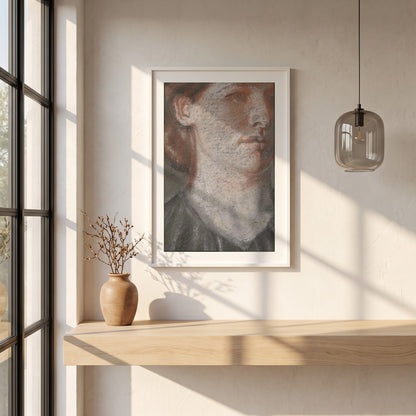 Portrait of Grace framed print in a white frame on a plaster wall above an oak worktop in a bright Scandinavian kitchen