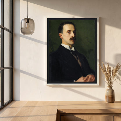 Portrait of Sir Hugh Lane framed print in a white frame on a plaster wall above an oak worktop in a bright Scandinavian kitchen