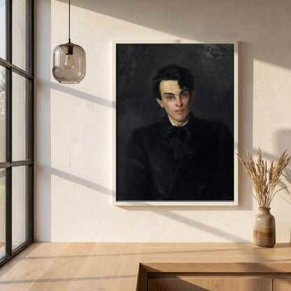 Portrait of W.B. Yeats framed print in a white frame on a plaster wall above an oak worktop in a bright Scandinavian kitchen
