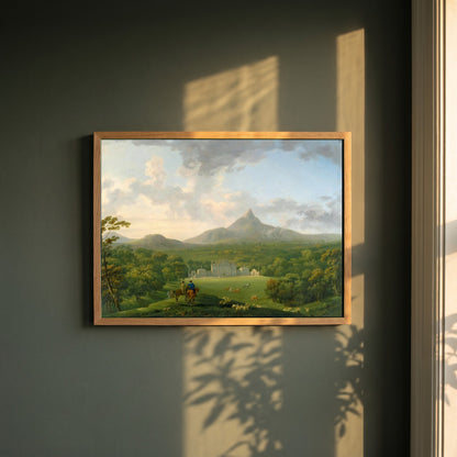 Powerscourt framed print in a natural oak frame on a dark green wall beside a window, dappled plant shadow