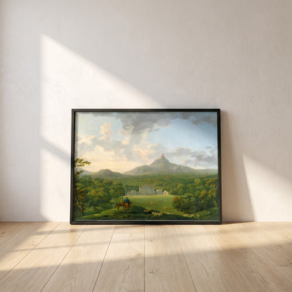 Powerscourt framed print in a black frame leaning against a white plaster wall on oak floorboards in morning light