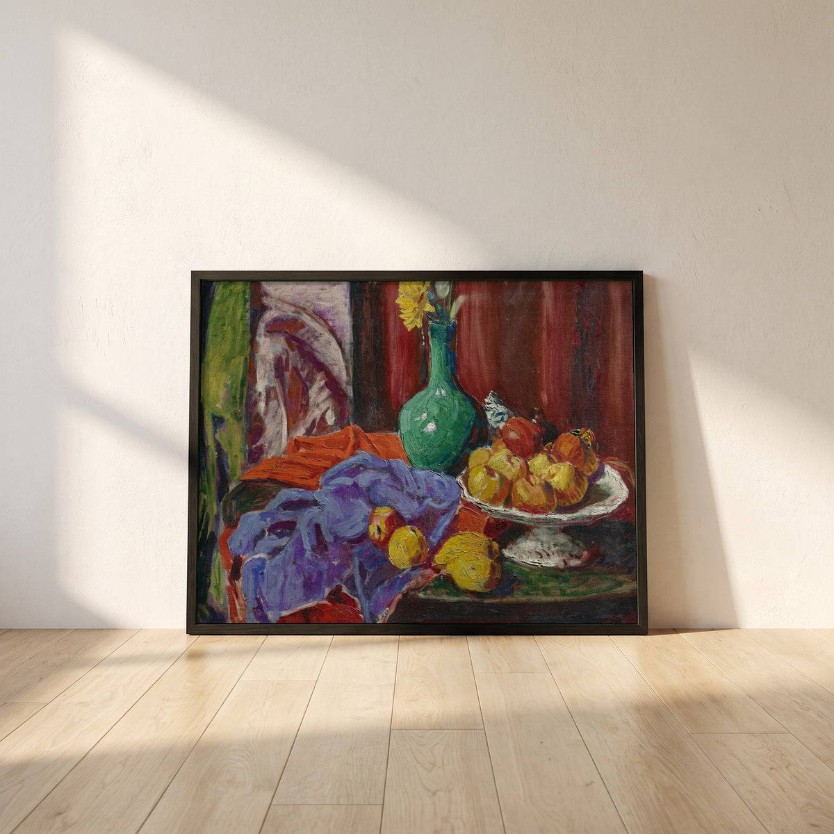 Roderic O’Conor framed print in a black frame leaning against a white plaster wall on oak floorboards in morning light
