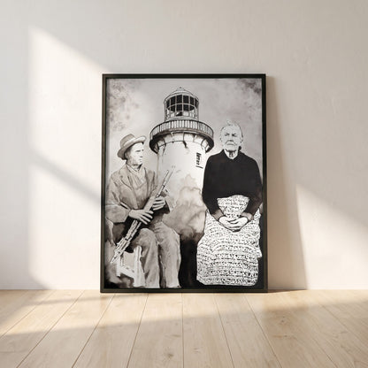 Róise Rua & Uilleann Piper framed print in a black frame leaning against a white plaster wall on oak floorboards in morning light