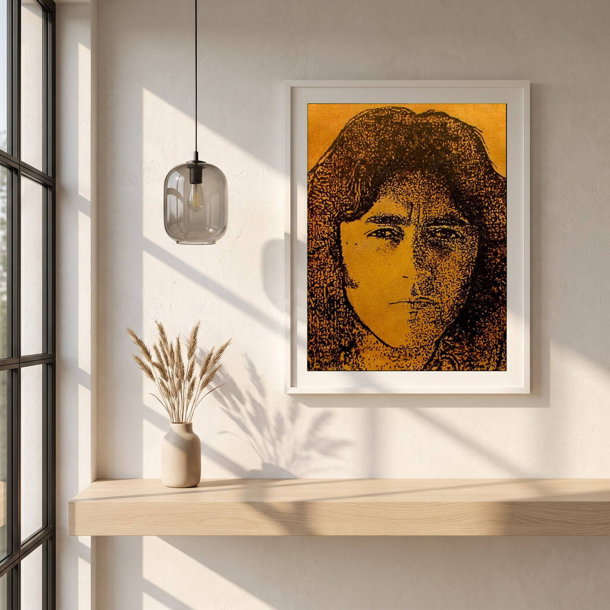 Rory Gallagher framed print in a white frame on a plaster wall above an oak worktop in a bright Scandinavian kitchen