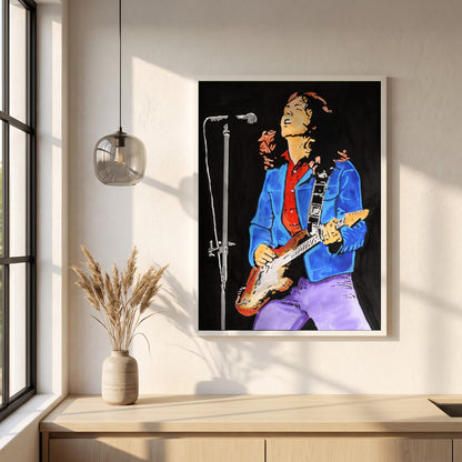 Rory Gallagher framed print in a white frame on a plaster wall above an oak worktop in a bright Scandinavian kitchen